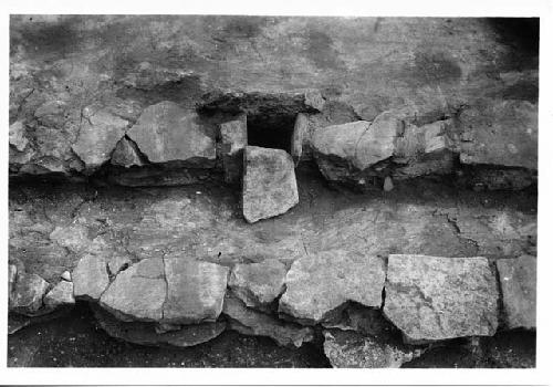 Photo of Kiva; detail of radiating wall showing north "sipapu."