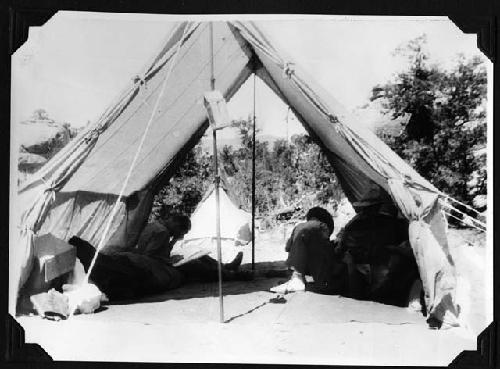 Men in tent