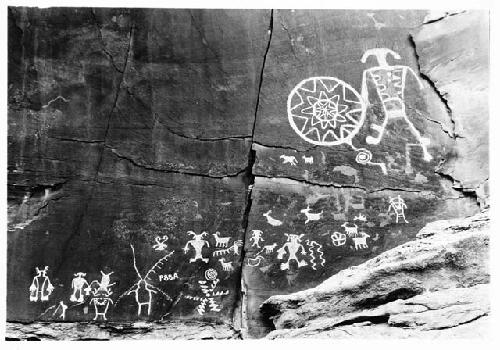 Petroglyph, human and animal figures