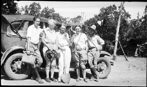 Group in front of car