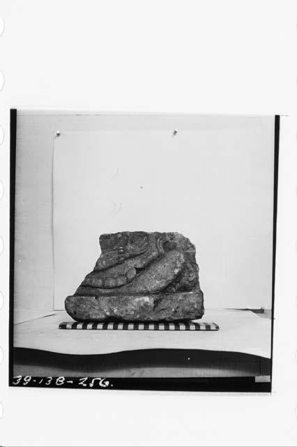 Lower part of sculptured figure, Mound 26; Debris