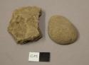 Earthenware body sherd, undecorated, gravel tempered; stone fragment