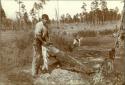 Removing Hair From Skin. John. Ah-Ho-Jay Ah-Bay Dressing a Skin at Bayou Lacombe, Louisiana