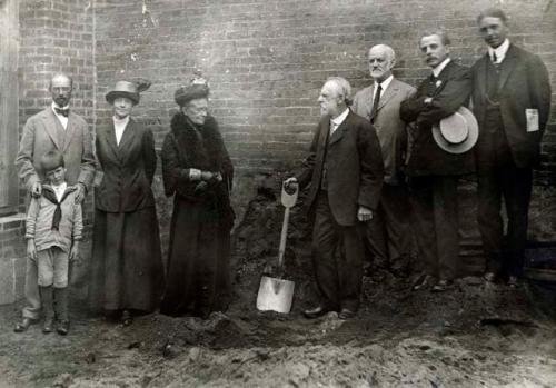 Ground breaking for Peabody Museum addition, June 21, 1913.  Left to right: Charles Peabody and his son Alfred, Alice Putnam, Mrs. F. W. Putnam, Frederic W. Putnam, Samuel Henshaw (director of the Museum of Comparative Zoology), Charles C. Willoughby, and Samuel J. Guernsey.