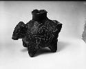 Black animal effigy vessel