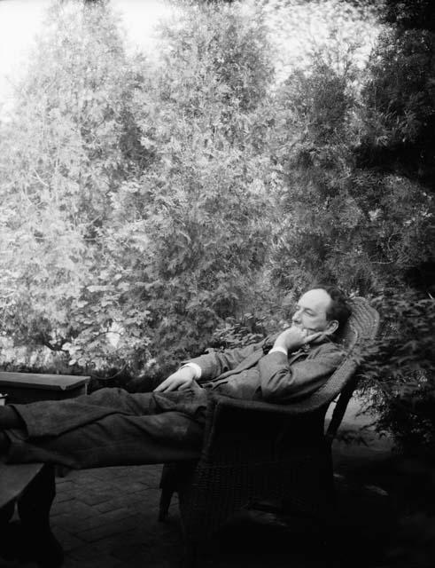 Photographer's uncle reclining in chair on terrace