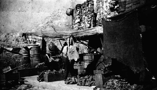 Vendor selling root vegetables