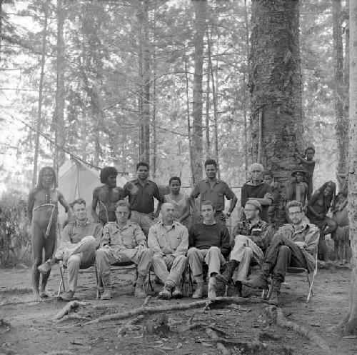 Group portrait; (L-R) Wali, Robert Gardner, Jan Broekhuijse, Eliot Elisofon, Peter Matthiessen, Michael Rockefeller and Karl Heider