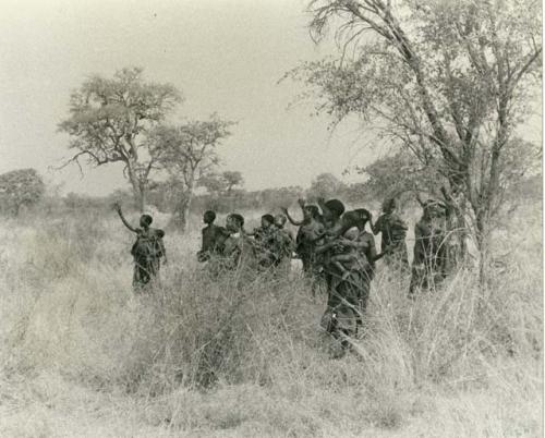 Group of Ju/'hoansi waving goodbye to the expedition