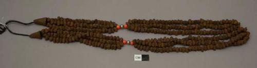 Necklace of dung and incense