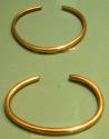 Brass bracelets. Worn as ornaments before 1900 and later used as currency.