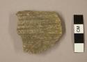 Ceramic body sherd, parallel incised designs