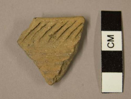 Ceramic rim sherd, incised diagonal and horizontal parallel lines