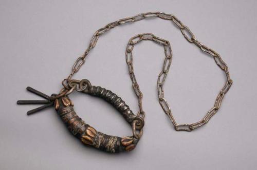 War charm worn by the chief Zo