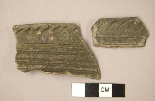 Ceramic rim sherds, incised horizontal and diagonal lines