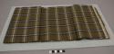 Fabric for man's longyi; olive and white plaid