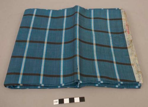 Fabric for man's longyi, blue and black checks