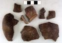 Ceramic sherds, rim and body, incised and plain decoration