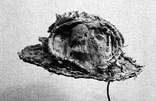 Head-piece covered with bark cloth