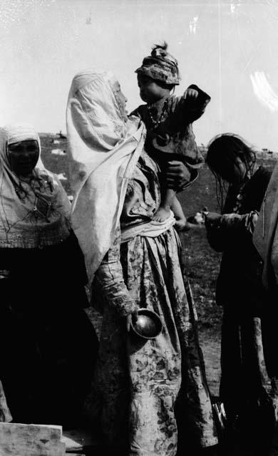 Kazak women and child