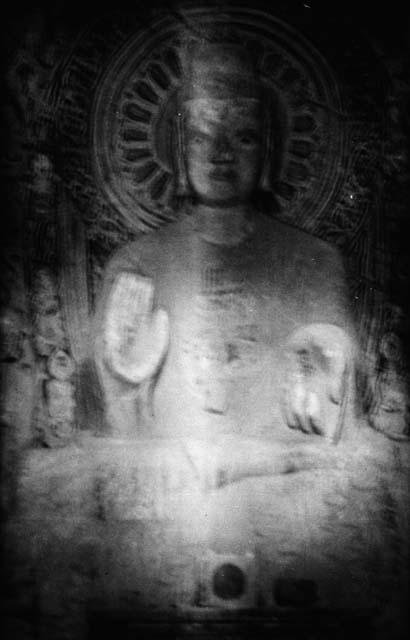 Ornate carving of Buddha or Bodhisattva