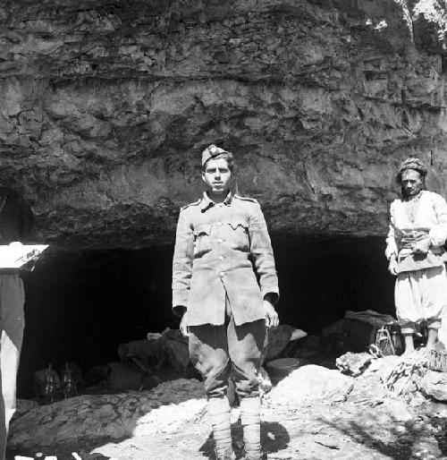 Iraqi policeman outside pastun cave on Jebel Baradost near Rowandiz