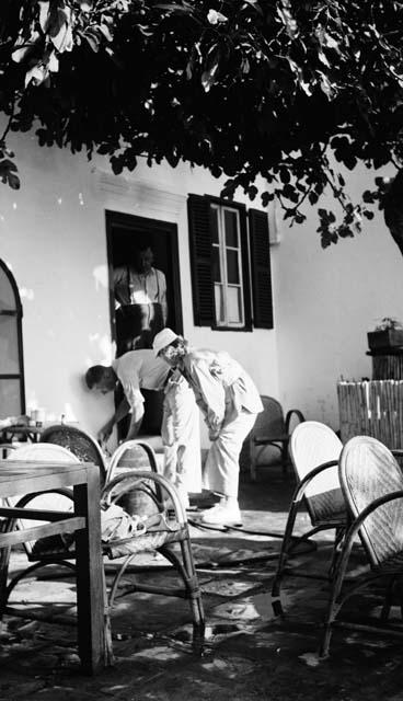 Three men at Hotel El Farhar bar, Excavation of Ashakar cave sites