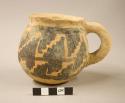 San Bernardo black-on-yellow pottery mug
