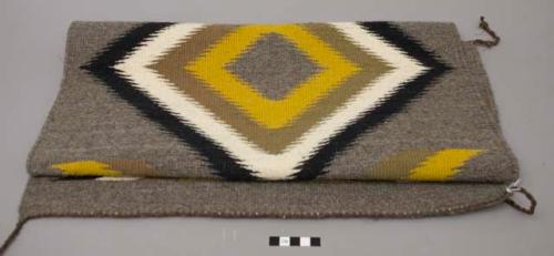 Rug, gray with yellow, black & white central diamond