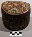 Round bark box decorated with porcupine quill
