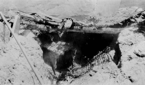 The roof on a temporary crossbeam, Cist 1, at left, Cist 2, under roof