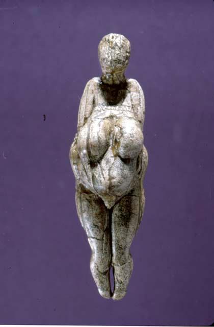 Ivory female figurine, profile view