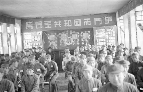 Classroom at Kang-ta, room filled with soliders