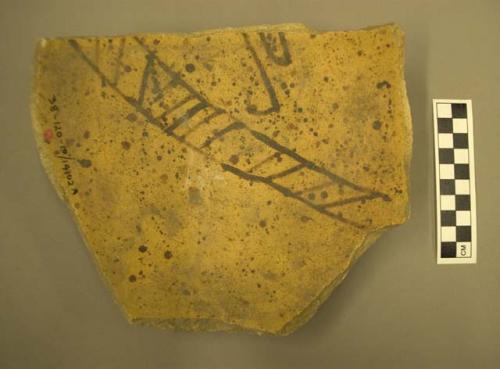 Part of San Bernardino black-on-yellow pottery bowl