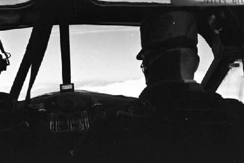 Pilots in plane cockpit