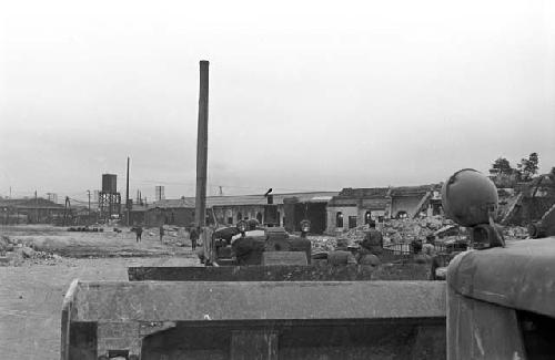 Soldiers watching wreck from a distance