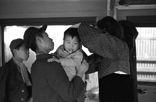 Baby crying as shot is given by nurse