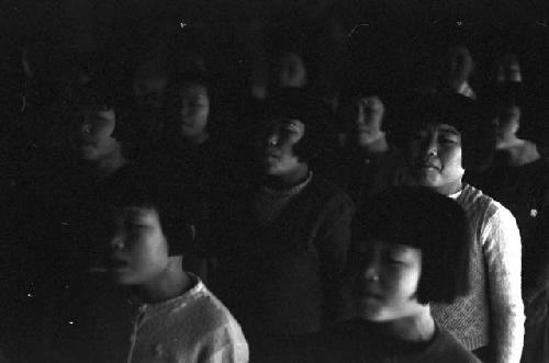 Kids sitting with each other in church