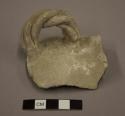 Plain sherd with twisted handle