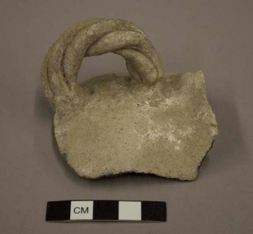 Plain sherd with twisted handle