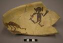 Sherds of restorable bowl with anthropomorphic decoration