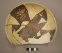Restored San Bernardino black-on-yellow pottery bowl
