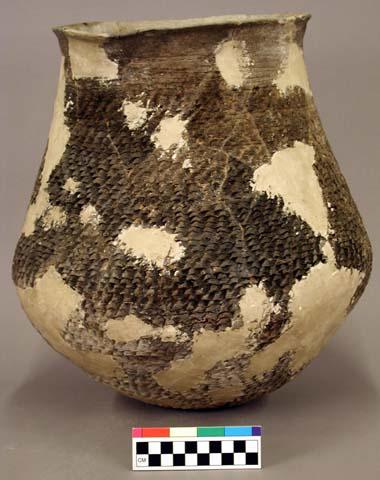 Ceramic jar, corrugated, reconstructed