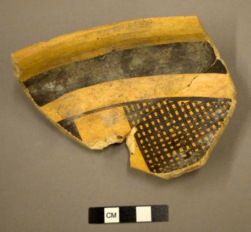 Restored Awatovi black-on-yellow potsherd