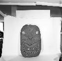 Large carved wooden head  used at top of entrance of the meetinghouse