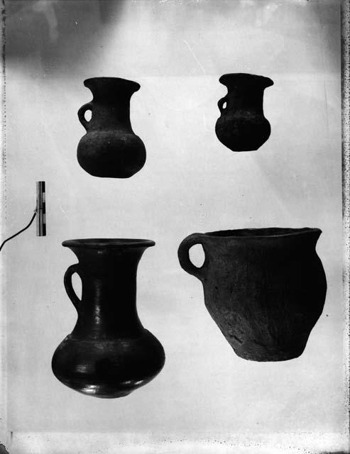 Pottery cup and 3 vessels