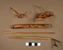 Fiber fragments, knotted, possible basket materials; wood fragments, one possibl