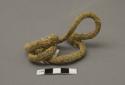 Rope, braided cotton string, knotted to form loop, trimmed