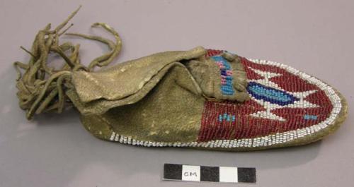 Child's left beaded moccasin