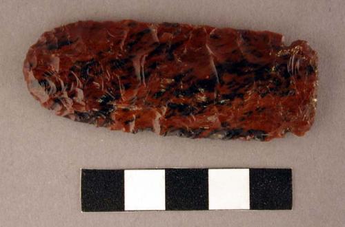 Chipped implement, red & black mottled obsidian